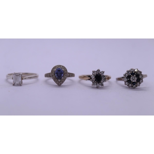 78 - 4 stone set rings