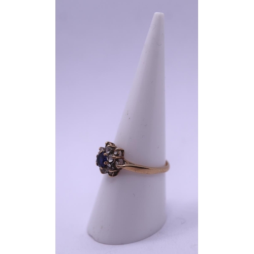 89 - 9ct gold Sapphire and CZ set ring