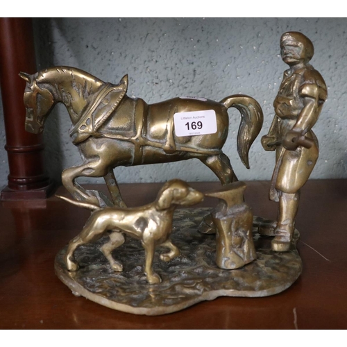 169 - Brass figure of a blacksmith with horse, dog and anvil