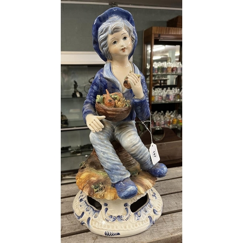 197 - Capodimonte figurine of boy with fruit - Approx H: 44cm