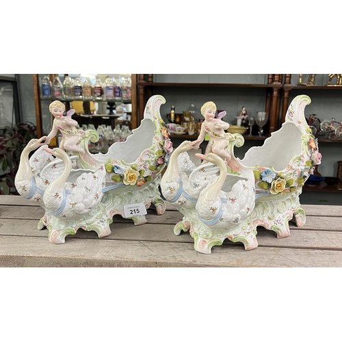 215 - Pair of antique table garnitures featuring swans and putti