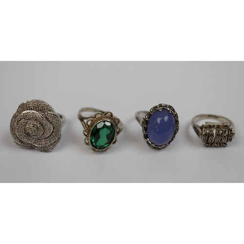 28 - 4 silver stone set rings