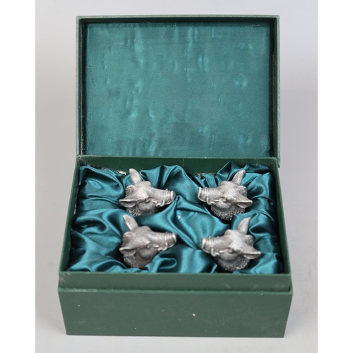 344 - Set of 4 cased stirrup cups in the form of boars