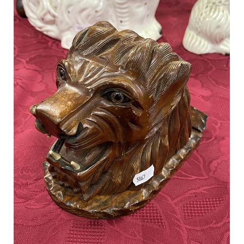 348 - Carved lions head cigarette dispenser