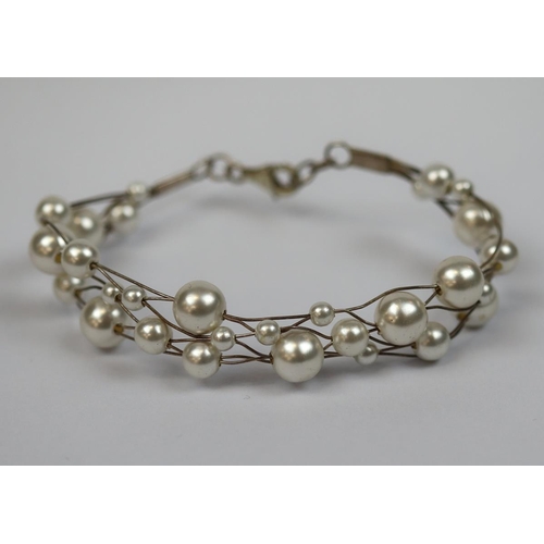 37 - Silver pearl set bracelet