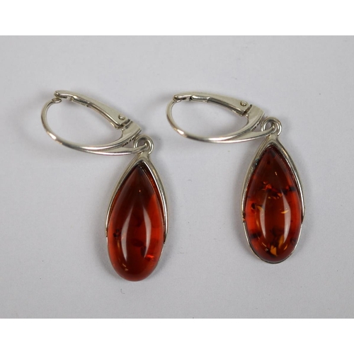 41 - Pair of silver & amber earrings