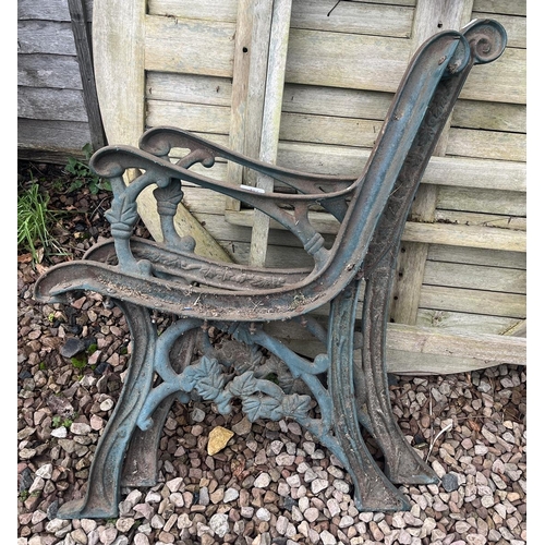 457 - Pair of cast iron bench ends