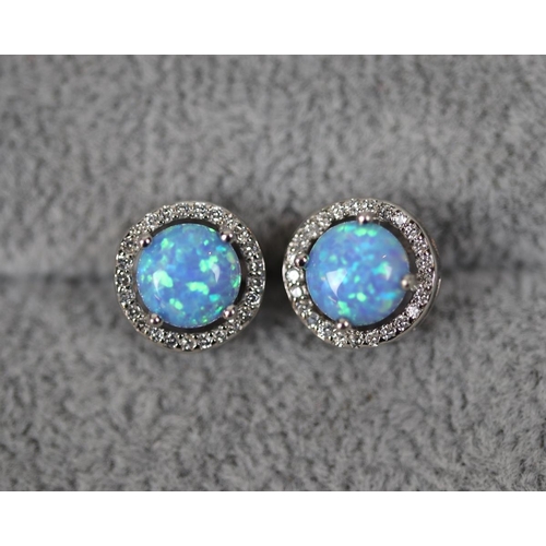 53 - Pair of silver and opal stone set earrings