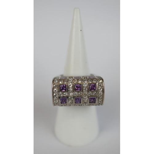 69 - Silver amethyst and stone set ring - Size L