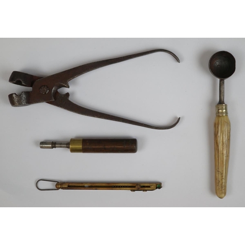 96 - Antique pistol and bullet working tools, inc. nipple key,snap cap dispenser, bullet mold and powder ... 