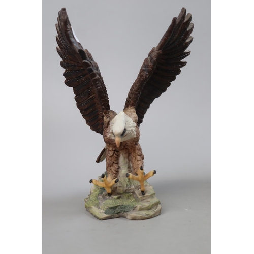 116 - Large Country Artists figure of a Yorkshire Terrier together with a figure of an eagle