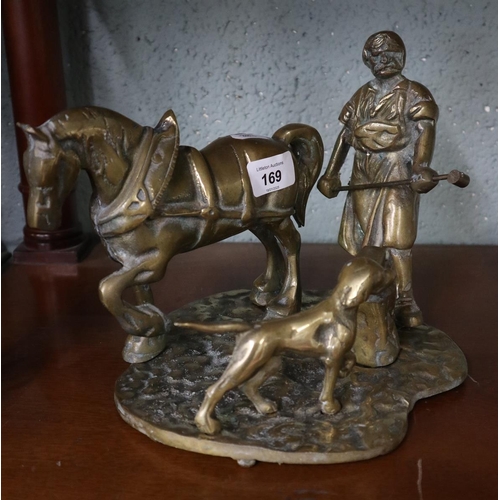 169 - Brass figure of a blacksmith with horse, dog and anvil