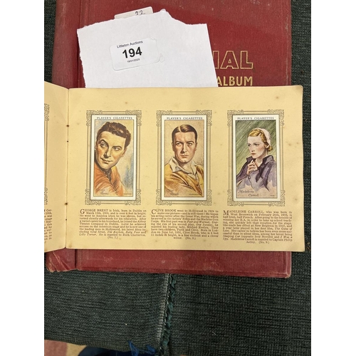 194 - Stamp album together with cigarette card album