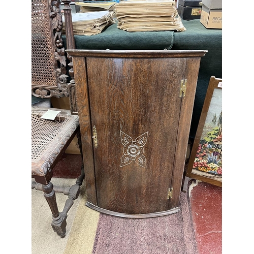 211 - Carved bergère chair together with corner cupboard and fire screen