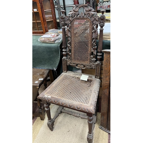 211 - Carved bergère chair together with corner cupboard and fire screen