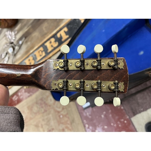 231 - Banjo-mandolin 17 fret  8 steel string solid back in case