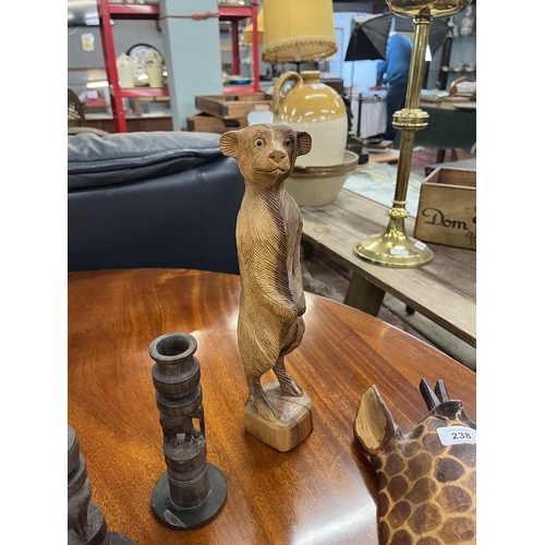 238 - Collection of African items to include carved meerkat figure