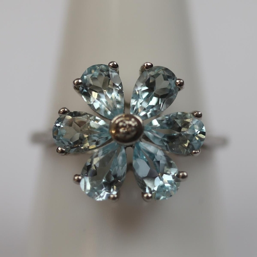 25 - Silver stone set daisy ring - Size Q