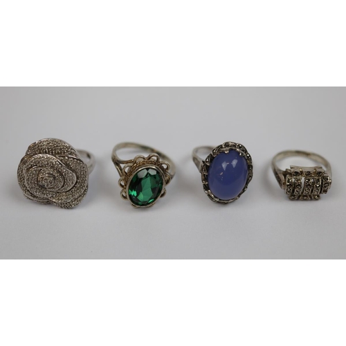 28 - 4 silver stone set rings