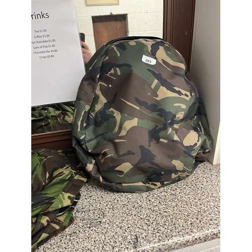 283 - Collection of waterproof and breathable camouflage jackets and 2x trousers together with rucksack