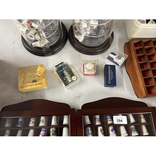 294 - Large collection of thimbles and display cases