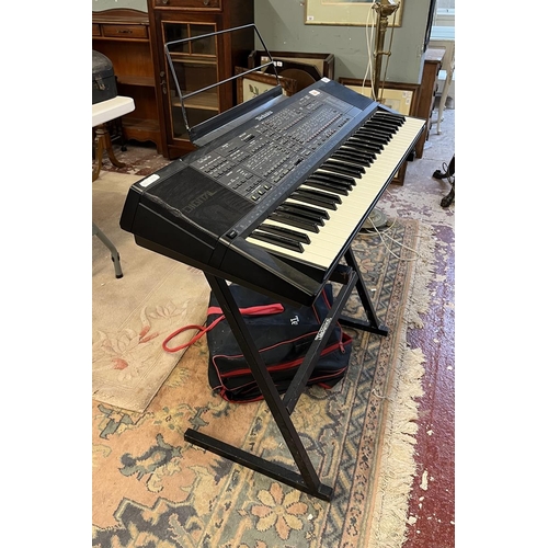 375 - Technics SX-K700 PMC electronic keyboard together with stand, foot pedal, carry case and book in goo... 