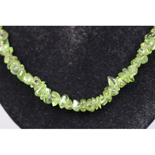 40 - Silver clasped peridot necklace