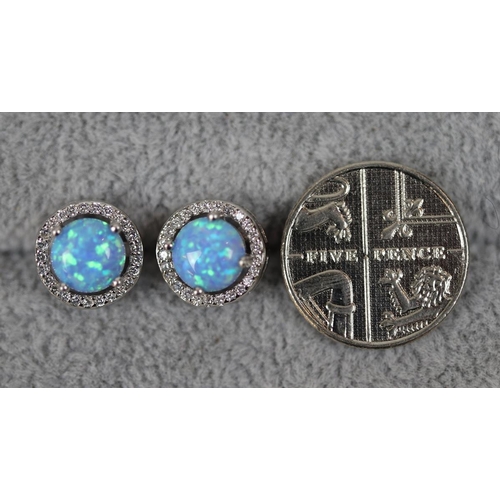 53 - Pair of silver and opal stone set earrings