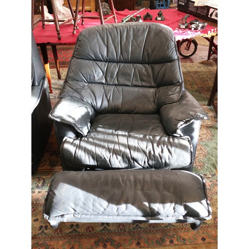 429 - Pair of leather swivel reclining armchairs