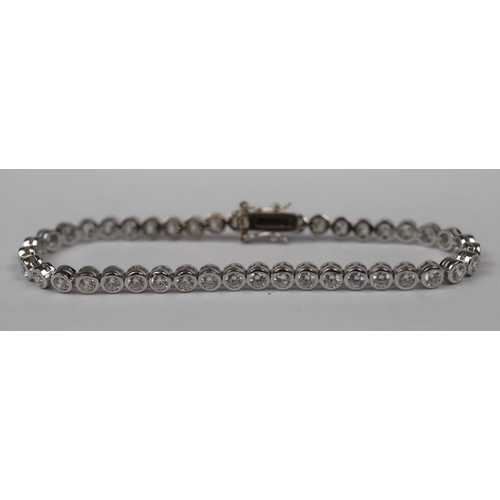 34 - Silver stone set tennis bracelet