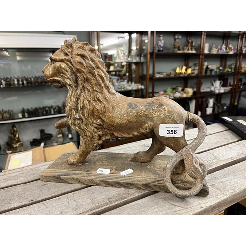 358 - Cast metal study of lion on wooden plynth - Approx H: 26cm