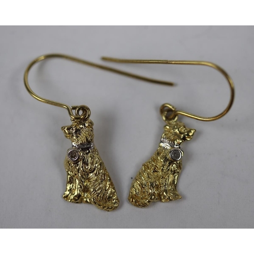 46 - Pair of silver dog earrings