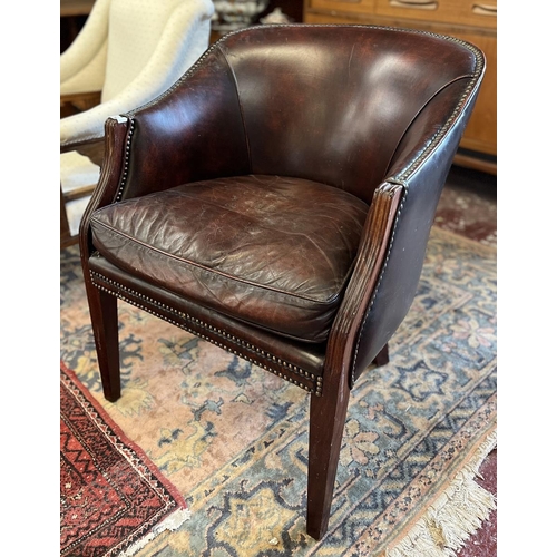 565 - Antique leather tub chair