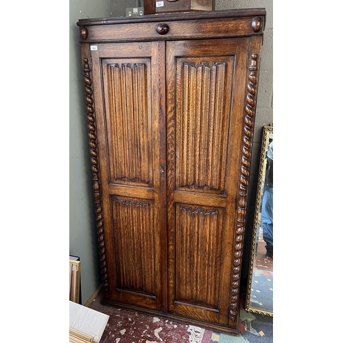 602 - Oak wardrobe with scroll work front - Approx W: 94cm D: 42cm H: 182cm