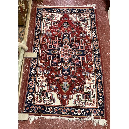 649 - Red patterned rug