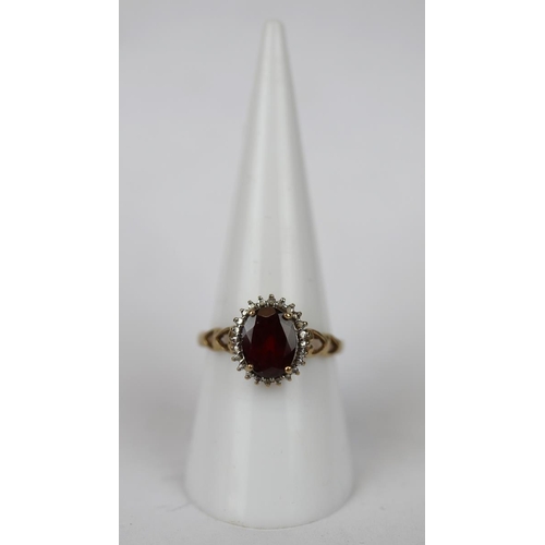 69 - 9ct gold garnet set ring - Size P