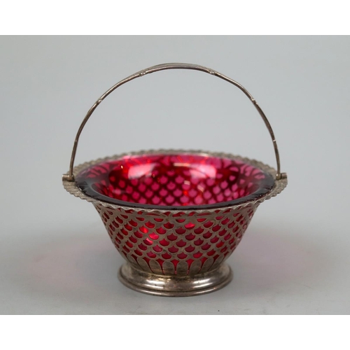 9 - Hallmarked silver pierced and ruby glass lined bonbon dish - Approx weight of silver 136g