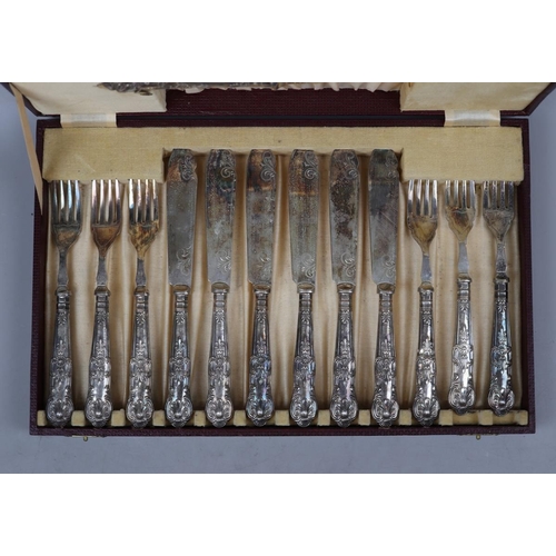 1 - Cased hallmarked silver handled cutlery together with a cased hallmarked silver teaspoon