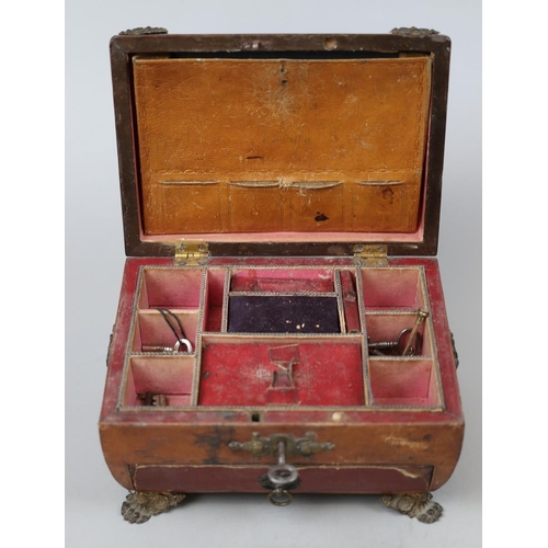 149 - Regency tooled leather bound, metal/gilt mounted work box with key and fitted interior