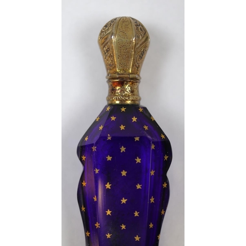 154 - Fine antique scent bottle in colbalt blue glass & silver gilt top with gilt decoration in origin... 