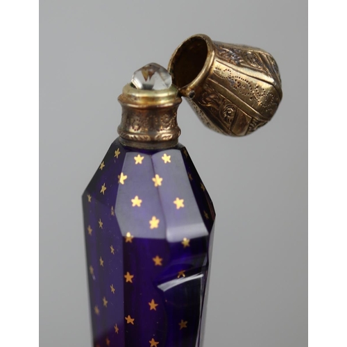 154 - Fine antique scent bottle in colbalt blue glass & silver gilt top with gilt decoration in origin... 