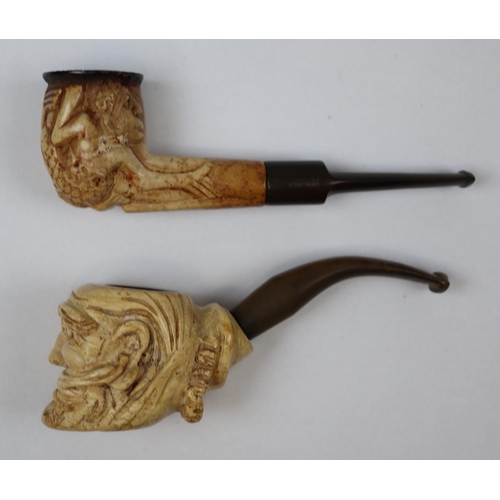 157 - Vintage 1960's hand carved Tanzanian block meerschaum pipe, together with a second carved meerschaum... 