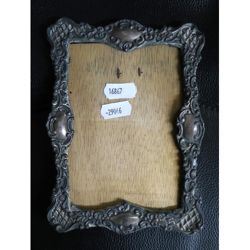 302 - Collection of metal ware to include hallmarked silver photo frame