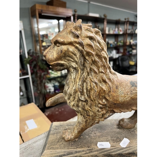 358 - Cast metal study of lion on wooden plynth - Approx H: 26cm