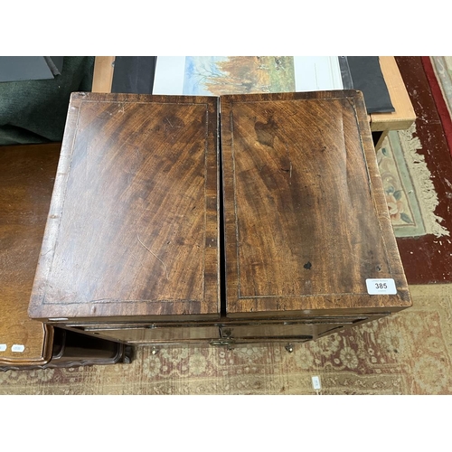 385 - Antique walnut gentleman's dressing cupboard