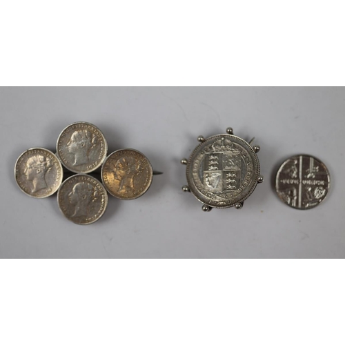 41 - 2 silver mounted coin brooches