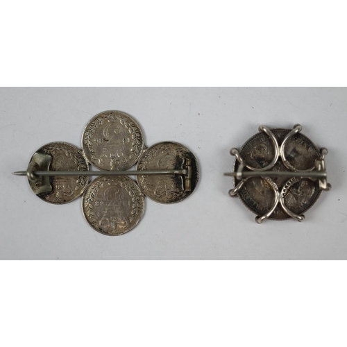 41 - 2 silver mounted coin brooches