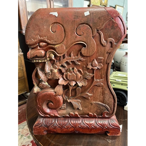 434 - Chinese red lacquered carved wooden piece showing a grotesque mask, bird and flowers - Approx H: 43c... 