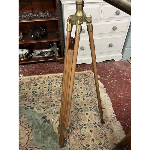 471 - 1900's style brass telescope on extending wooden tripod stand.