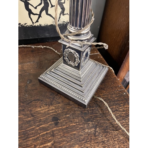 487 - Lamp - Raised on silver plate column Approx H: 87cm